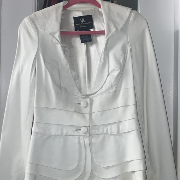 A vintage, white leather, supple Rock & Republic Collection.Shell is polyester. - Picture 1 of 6